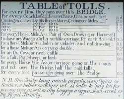 There was a toll tax which each one had to pay for crossing the iron bridge. even the royal family had to pay the tax.  It was removed in 1950. You ca